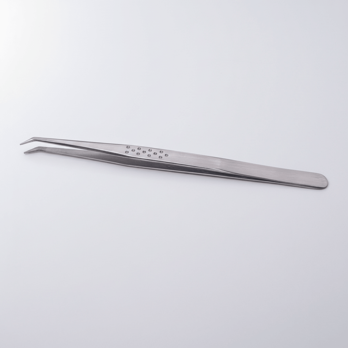 Slim Grip silver fiber tip isolation tweezer – L shape on gray background