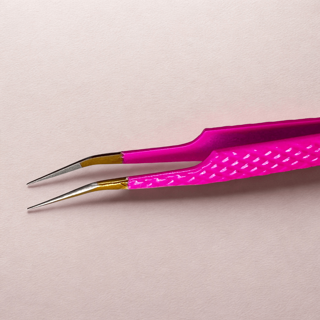 Pretty Pink isolation tweezer – alternate angle on gray background
