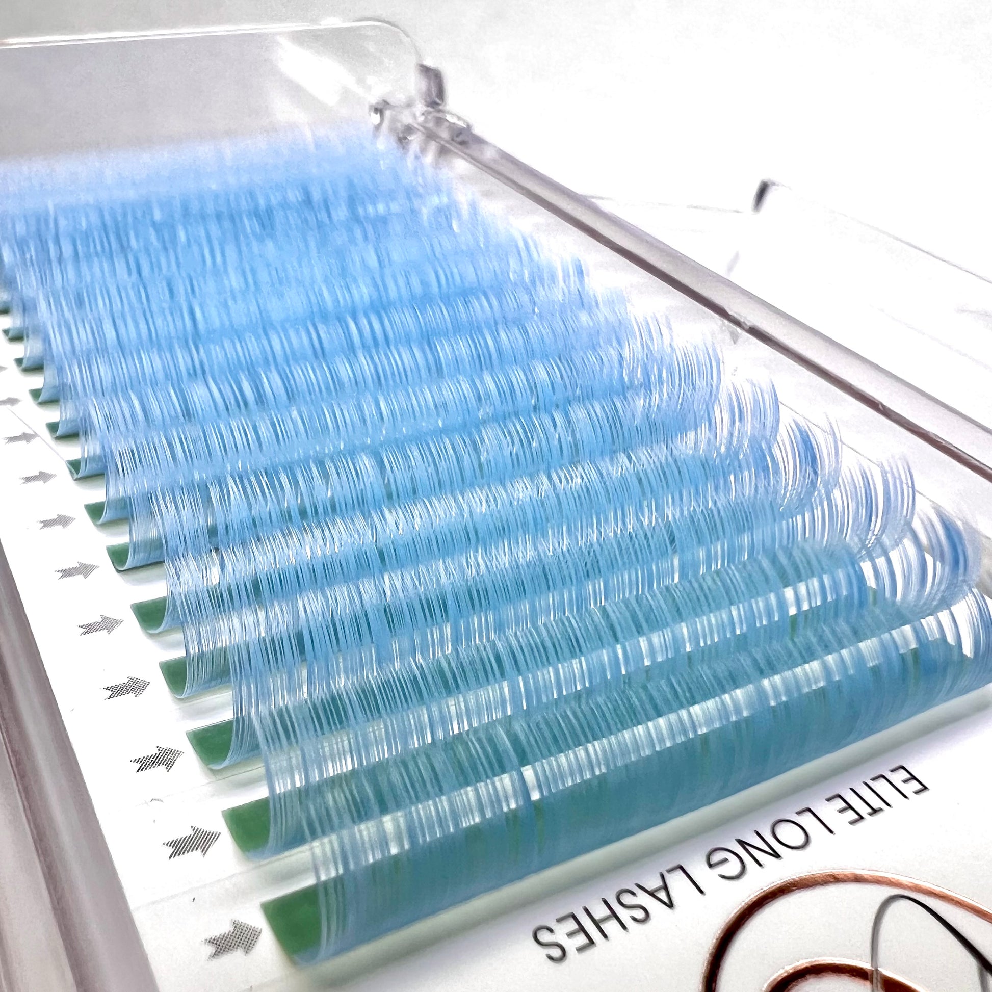 A tray of baby blue, matte mink eyelash extensions. 16 lash lines per tray.