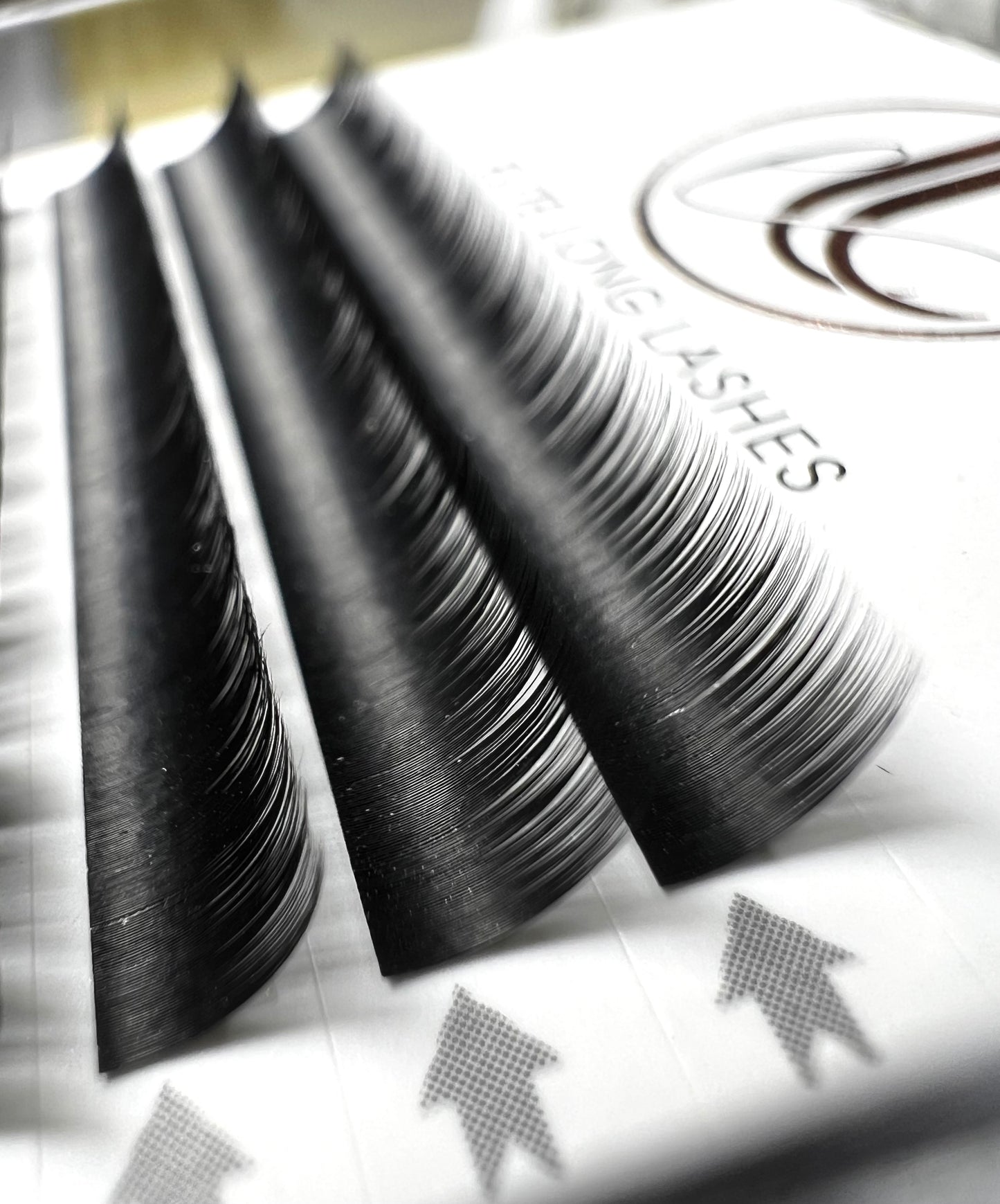 A tray of black, matte mink eyelash extensions. 16 lash lines per tray.