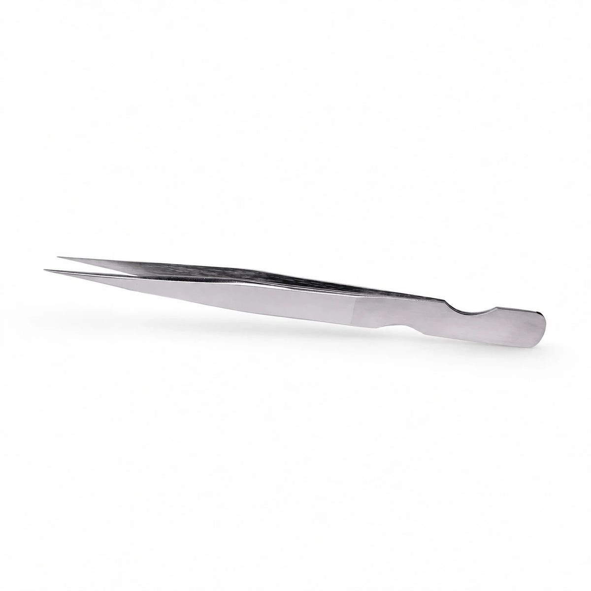 Elite Long Lashes Assassin’s Needle silver I-Shape isolation tweezer with fine straight tips and a shaped handle on a soft white background.