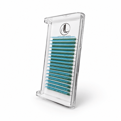 Elite Long Lashes baby blue cashmere lash extensions arranged in rows in a clear tray on a soft white background.