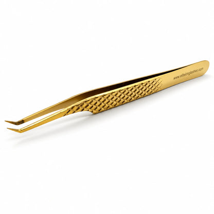 Elite Long Lashes Gold Precision Picker S-shape isolation lash tweezer with a textured diamond grip on a soft white background.