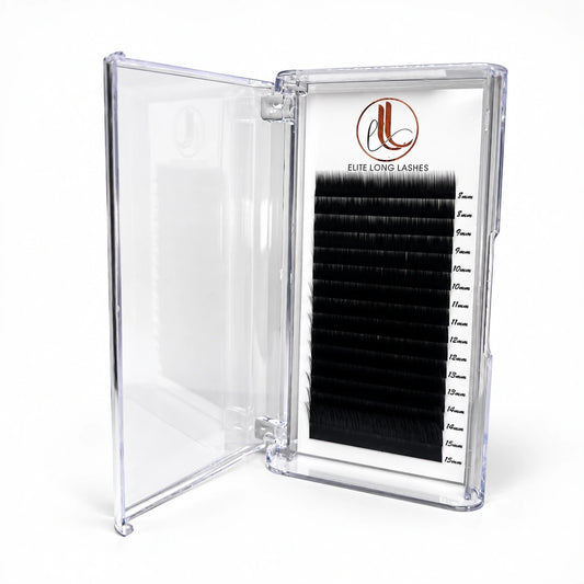 Elite Long Lashes I Curl matte black bottom lash extensions in an open clear tray on a soft white background.