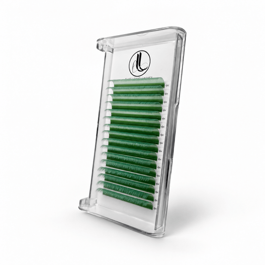 Elite Long Lashes jade green cashmere lash extensions arranged in rows in a clear tray on a soft white background.