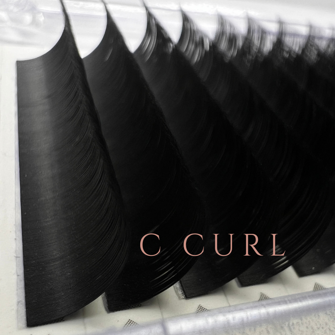 C curl matte black lash fibers shown in their tray