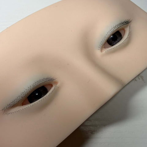 Premium silicone practice face for lash extension training with realistic 3D eyes
