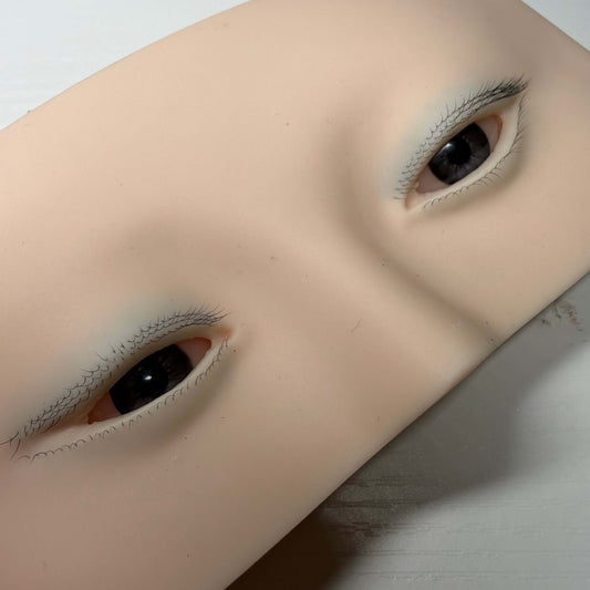 Premium silicone practice face for lash extension training with realistic 3D eyes