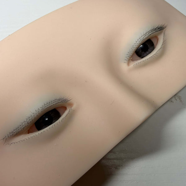 Premium silicone practice face for lash extension training with realistic 3D eyes